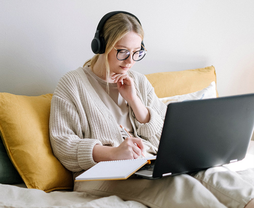 girl studying and working at home