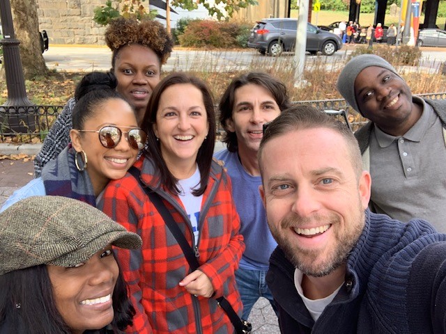 People smiling taking a selfie