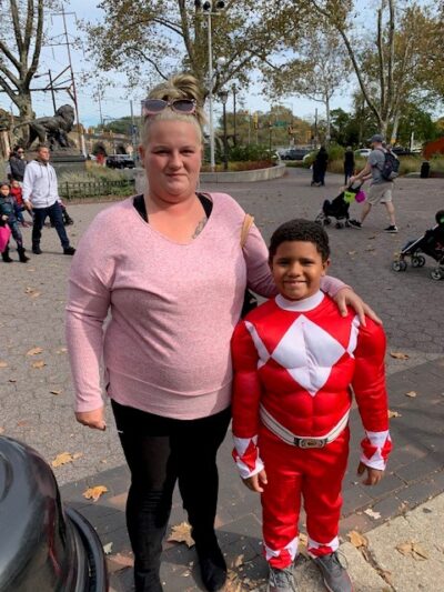 Mother and her child wearing a costume